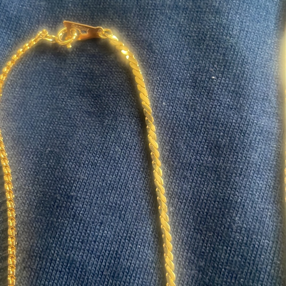 Two Gold toned “S” Chains